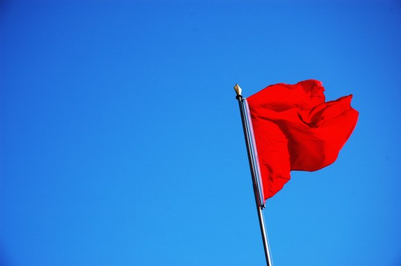 An actual flag is much easier to spot than the fact that you and your spouse are horrible incompatible.